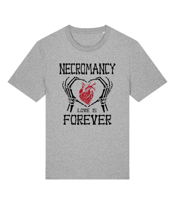 A heather gray short-sleeve t-shirt with a graphic print on the front. The design features the words 'NECROMANCY' and 'LOVE IS FOREVER' in a distressed black font, framing a red anatomical heart held together by skeletal hands.