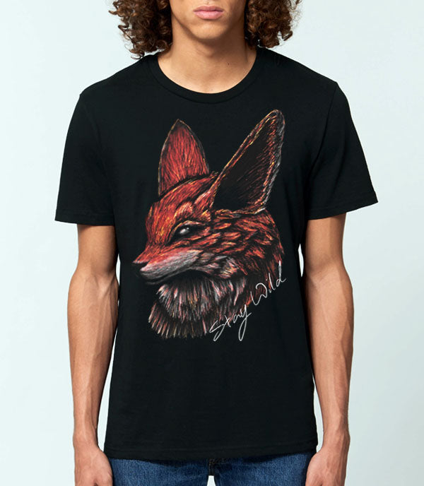 A man wearing a black crewneck t-shirt with a detailed graphic of a red fox head with the words "stay wild" on the front, set against a plain light gray background.